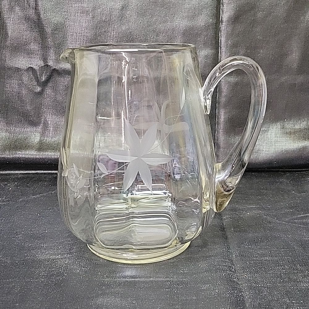 Mid century etched crystal pitcher.